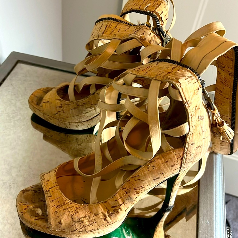 Lisa G Pliner wood like high heels with tassel and zip all the  way up straps.